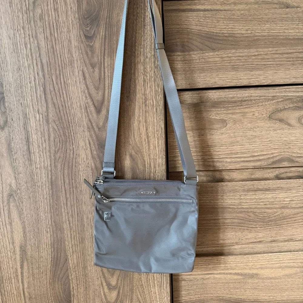 Tumi voyageur tula crossbody bag
